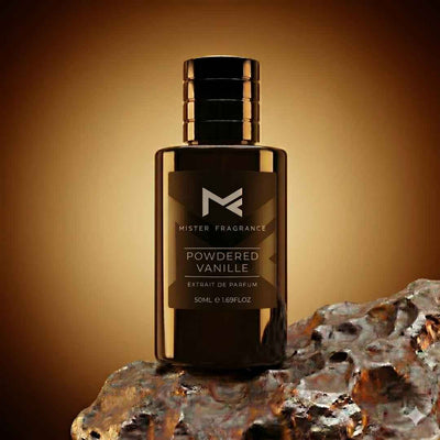 Dark glass perfume bottle with black cap and gold trim, Powdered Vanilla extrait de parfum